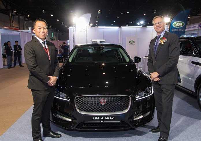 Jaguar/Land Rover took pride of place at the entrance of Thai-UK 2016. Managing Director Charnchai Mahantakun (left) introduces the latest models to H.E. British Ambassador Brian Davidson.