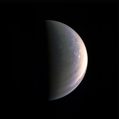 This Aug. 27, 2016 image provided by NASA shows Jupiter’s north polar region, taken by the Juno spacecraft 120,000 miles (195,000 kilometers) away from the planet. Unlike the equatorial region’s familiar structure of belts and zones, the poles are mottled with rotating storms of various sizes, similar to giant versions of hurricanes on Earth. Jupiter’s poles have not been seen from this perspective since the Pioneer 11 spacecraft flew by the planet in 1974. (NASA/JPL-Caltech/SwRI/MSSS via AP)