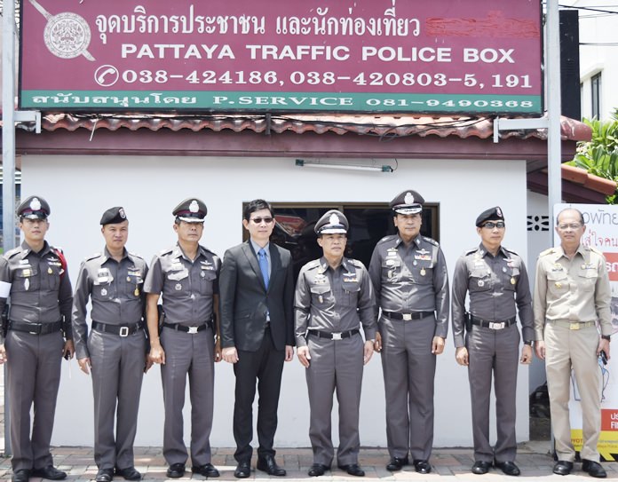 Royal Thai Police deputy chief Pol. Gen. Wuthi Liptapanlop and Toyota Deputy Managing Director Wuthikorn Suriyachantananon unveil the multi-lingual signs they hope will educate Pattaya drivers on the rules of the road.