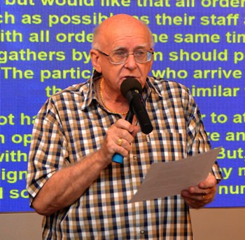 Member Les Edmonds advises members and guests at the PCEC’s regular Sunday meeting about the raffle he is arranging as a fund raiser for the Pattaya Orphanage, which will begin with the Sunday, September 25 meeting.