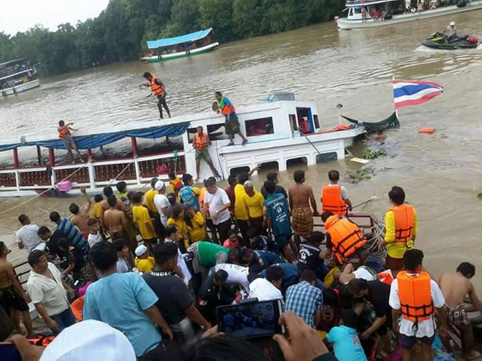 Rescuers attempt to bring the sunken ferry closer to shore in the aftermath of the tragedy. (Photo from Boonlua Chatree)