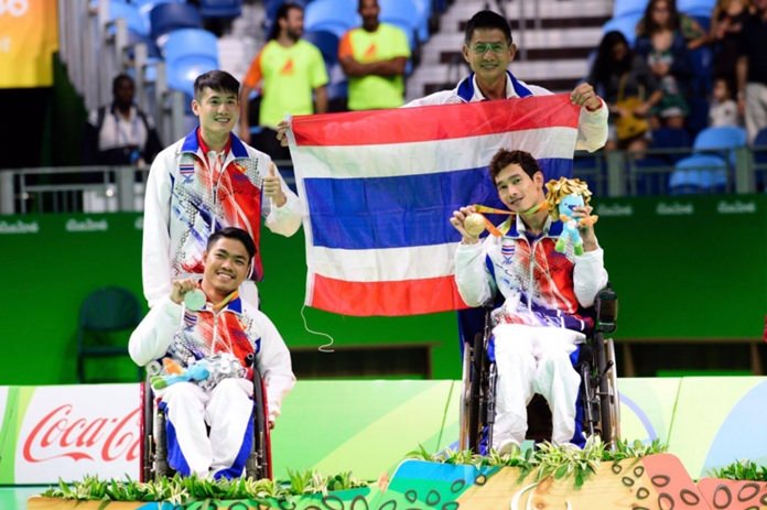 Watcharaphon Vongsa (front right) and Worawut Saengampa (front left) won gold and silver respectively for Thailand in the Individual Boccia at the Rio Paralympics.