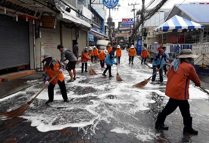 City workers give Walking Street a good scrubbing.