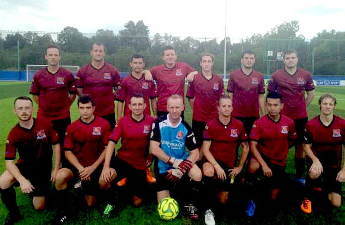 Pattaya City line up for a team photo prior to their match against Hanuman Boys in Bangkok last weekend.