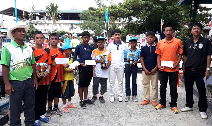 Tournament winners pose with their trophies.