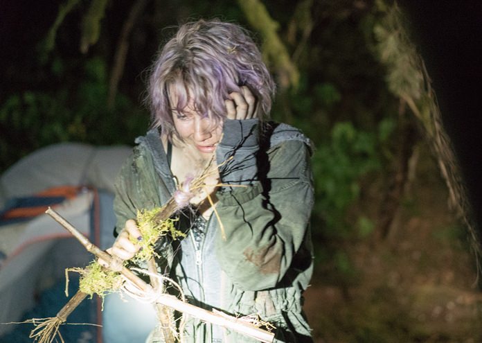 Valorie Curry is shown in a scene from “Blair Witch.” (Chris Helcermanas-Benge/Lionsgate via AP)