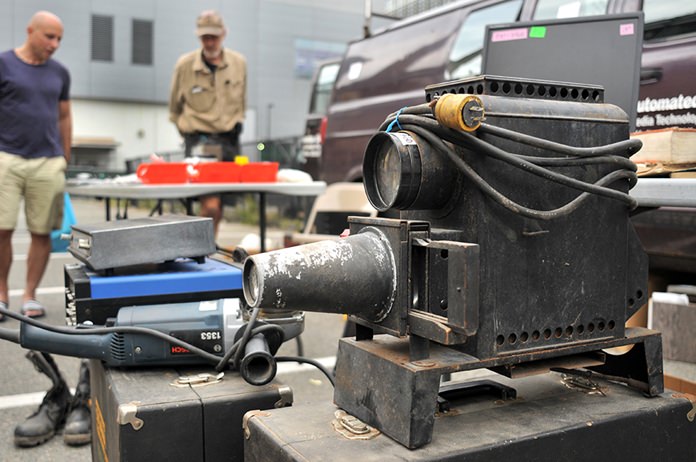 A photo slide Magic Lantern projector, circa 1930, is displayed at MIT’s Radio Society flea market on the campus of the Massachusetts Institute of Technology in Cambridge, Mass. (AP Photo/Collin Binkley)