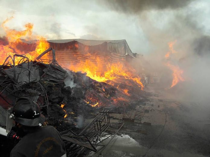 Fire destroyed a scrap warehouse near the Amata City industrial estate in Sriracha, but injured no one.