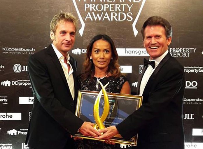 Winston Gale (left) and Sukanya Gale (centre) receive the ‘Best Luxury Condominium 2016’ award for the Riviera Wongamat Beach from Clayton Wade (right), Managing Director of Premier Homes Real Estate, during the Thailand Property Awards ceremony in Bangkok, Sept. 22.