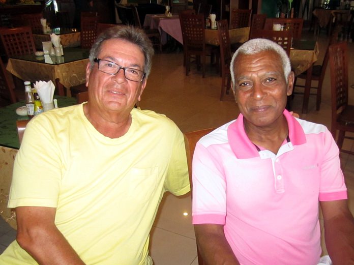 Landis Brooks (right) with John Pierrel.