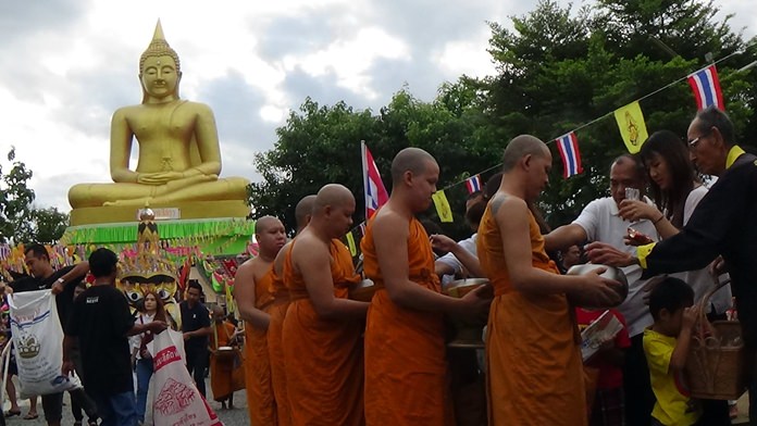 Monks collect alms as is tradition.