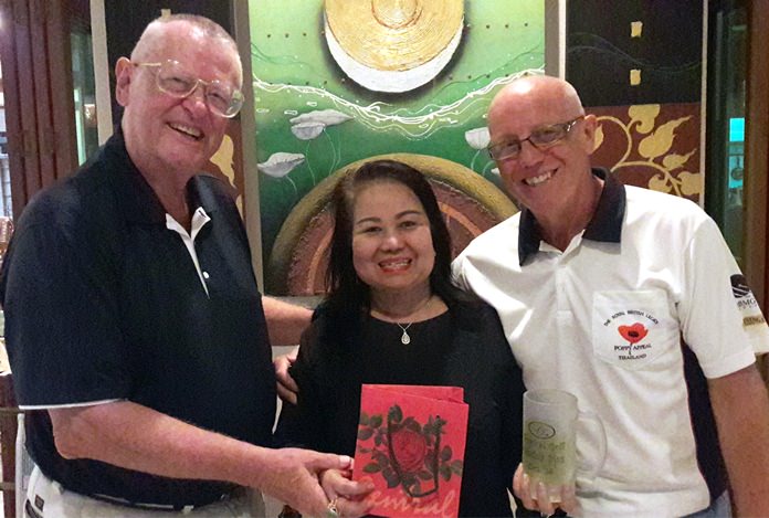 Golfer of the Month, Dick Warberg (left), and Monthly Mug winner, John Davis (right), pose with Lek from BJ’s Holiday Lodge.