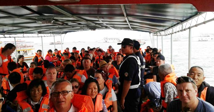 Koh Larn ferries finally are complying with safety regulations by keeping passenger numbers down and requiring everyone to wear life vests, Pattaya officials said.