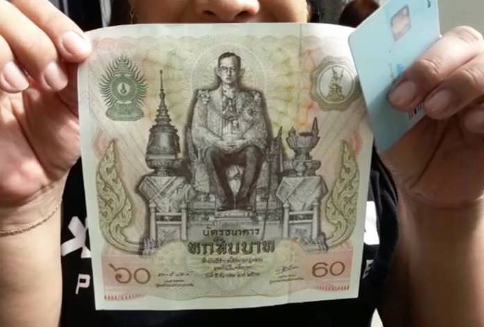 Siam Commercial Bank’s Thepprasit Road branch made available the special edition “60th Birthday Anniversary” series banknotes carrying the denomination of 60 baht.