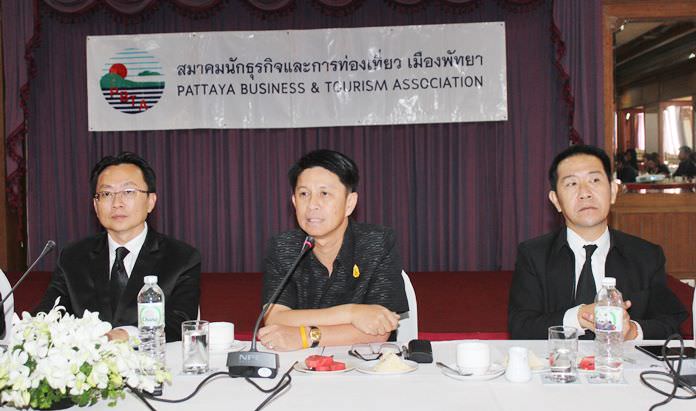 Gov. Pakarathorn Thienchai (center) announces all events and activities promoting tourism will be allowed to go forward during the one-year royal mourning period, but must be adjusted to pay proper respect to HM the late King.