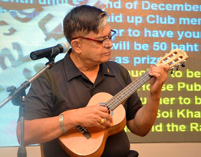 Member Al Serrato entertains his fellows PCEC members with some ukulele music prior to the start of the main program.