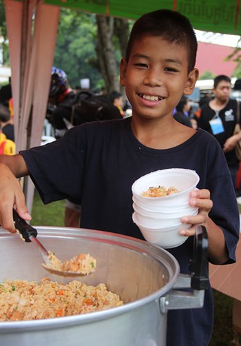 The children from the Home helped serve breakfast.