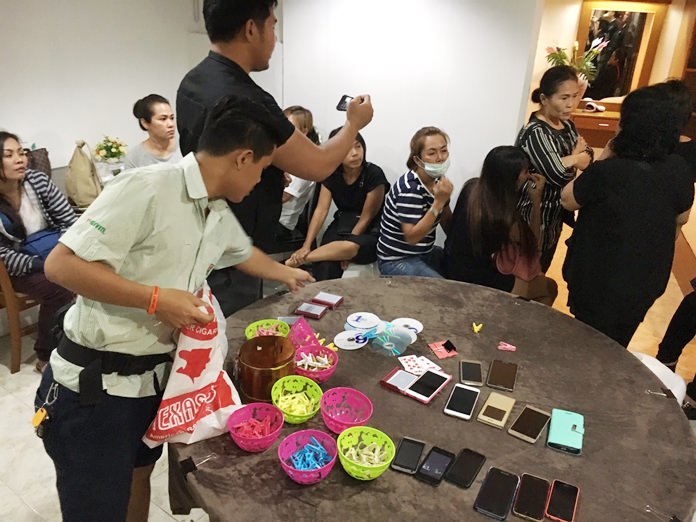Banglamung and army personnel swept into the Phuping Pattaya View in Moo 11 village, seizing an unspecified amount of cash and playing cards.