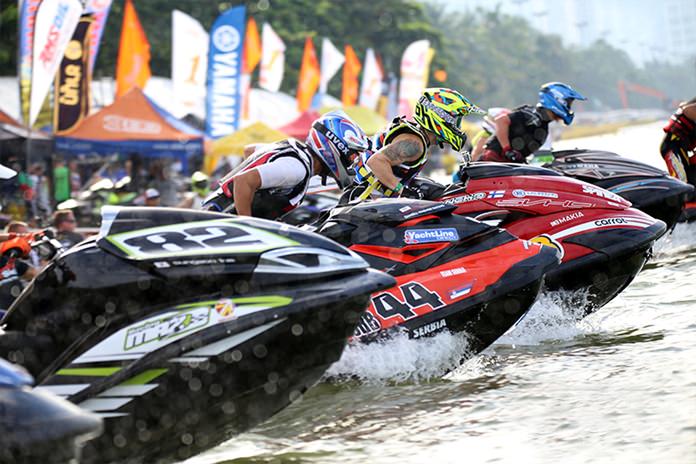 Racers line-up at the start of another moto.