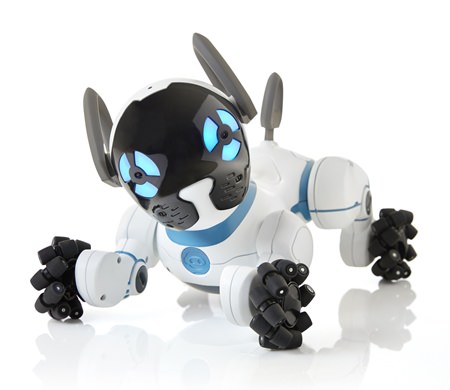 This photo provided by WowWee shows CHiP, a robot dog that cuddles, plays fetch and follows you around the house. (Samuel Pasquier/Ariane Carrier-Cliche/Courtesy of WowWee via AP)