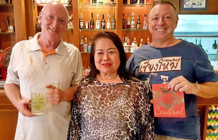 Graham Buckingham (left) and Tom Herrington (right) pose for a photo with ‘the boss’.