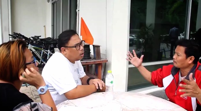 Pornthip Chuanjailok (right) protests his innocence.