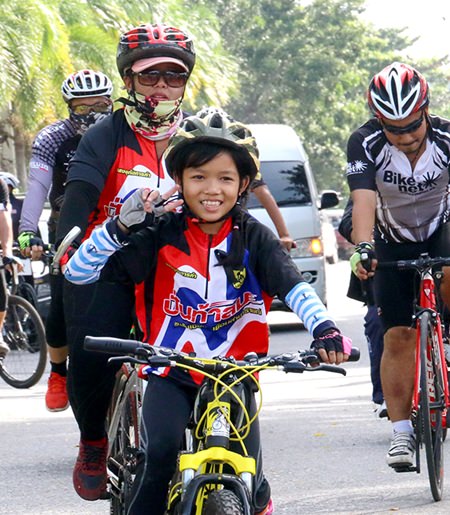 Young and old took to two wheels to celebrate the life of the much revered Thai monarch.