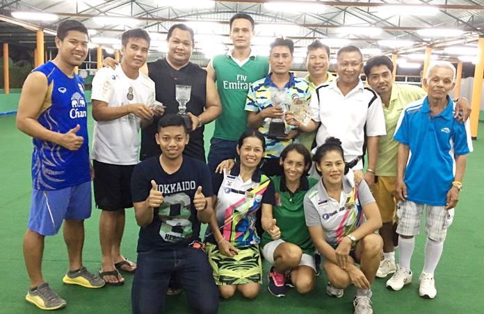 Top players from the triples tournament pose for a photo at Coco Resort in Pattaya, Sunday, Dec. 25.