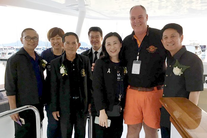 Philippe Guenat, MD of the Ports Marina Groups Co., Ltd., (2nd right) welcomes Chonburi Governor  Pakarathorn Thienchai (right) and his entourage on board the Heliotrope 48.
