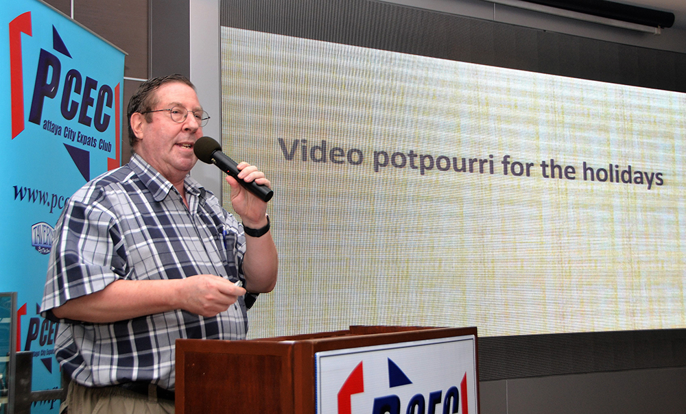 Member David Garmaise explains to his PCEC audience that his presentation would include a "potpourri" of clips from various video shows and performances; some but not all with a Christmas theme.