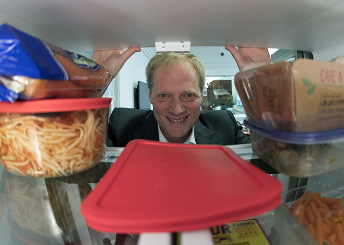 Brian Wansink, a food behavior scientist at Cornell University, says even though it shortens shelf life, move fruits and vegetables out of crisper drawers and put them at eye level. (AP Photo/Mike Groll)