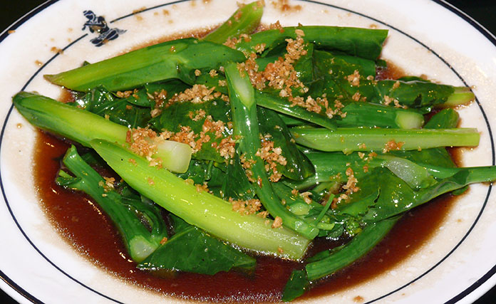 Sautéed kale with soya sauce.
