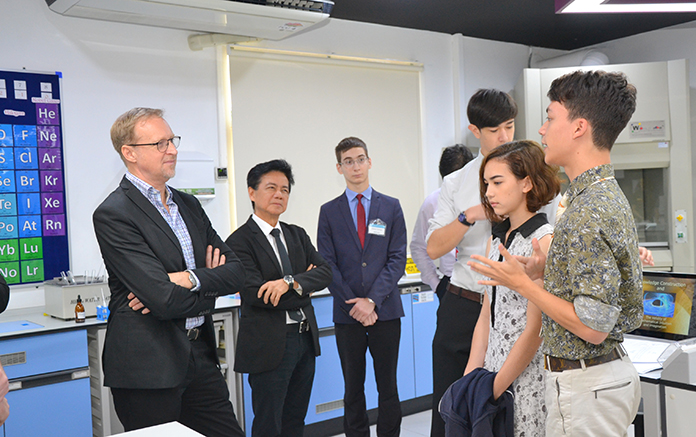 The Ambassador chats with students and teachers during his tour of the new science lab.