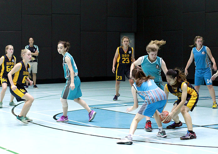 Regents International School Pattaya girls take on The British School of Guangzhou on the basketball court.