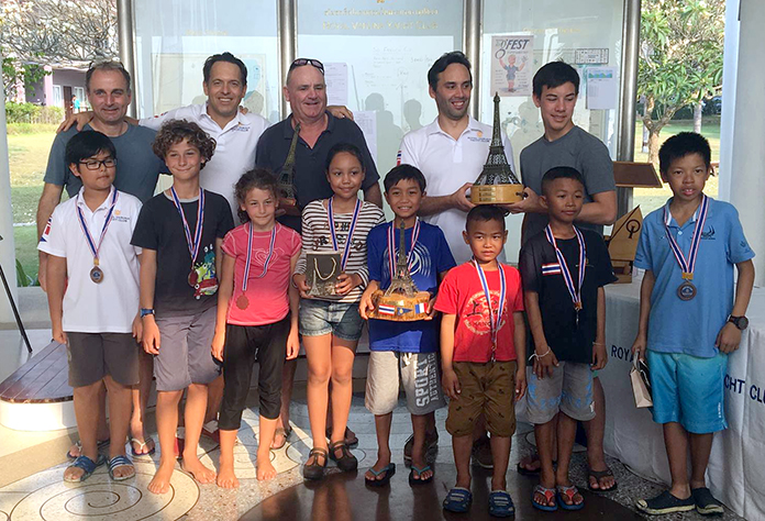 Trophy and medal winners from the French Cup 2017 pose with organizers at the Royal Varuna Yacht Club in Pattaya, Sunday, Feb. 5.