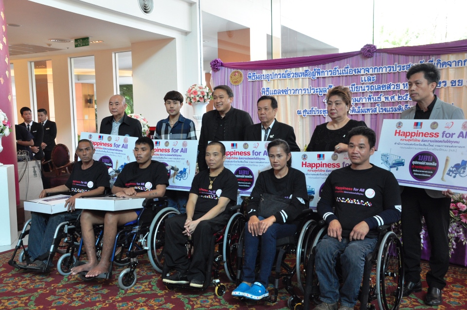 Chiang Mai residents disabled and injured from road accidents received wheelchairs and other equipment purchased from funds raised by the auction of lucky license plates.