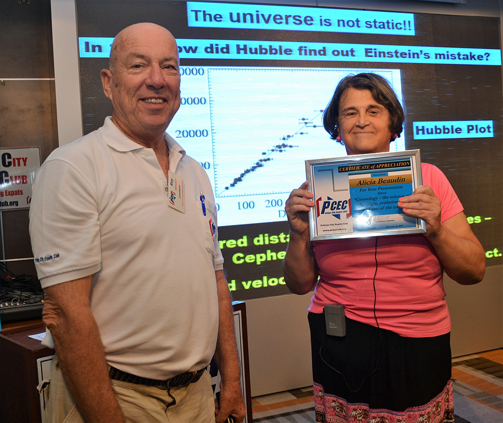 MC Roy Albiston presents the PCEC's Certificate of Appreciation to member Alicia Beaudin for her interesting and informative talk on Cosmology. 
