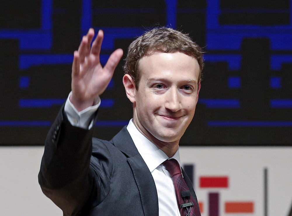 Mark Zuckerberg released a missive Thursday, Feb. 16, 2017, outlining his vision for the social network and the world at large. Among other things, Zuckerberg hopes that the social network can encourage more civic engagement, an informed public and community support in the years to come. (AP Photo/Esteban Felix, File)