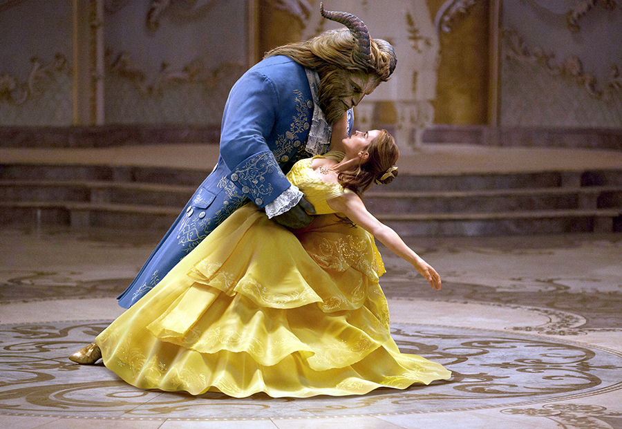 This image shows Dan Stevens as The Beast, left, and Emma Watson as Belle in a live-action adaptation of the animated classic "Beauty and the Beast." (Disney via AP)