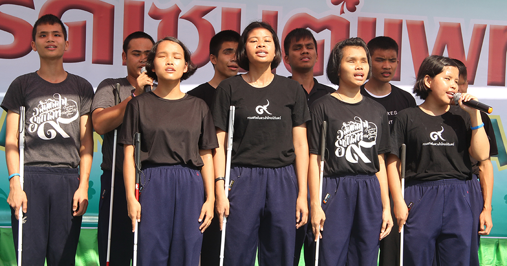 The students from the School for the Blind sang.