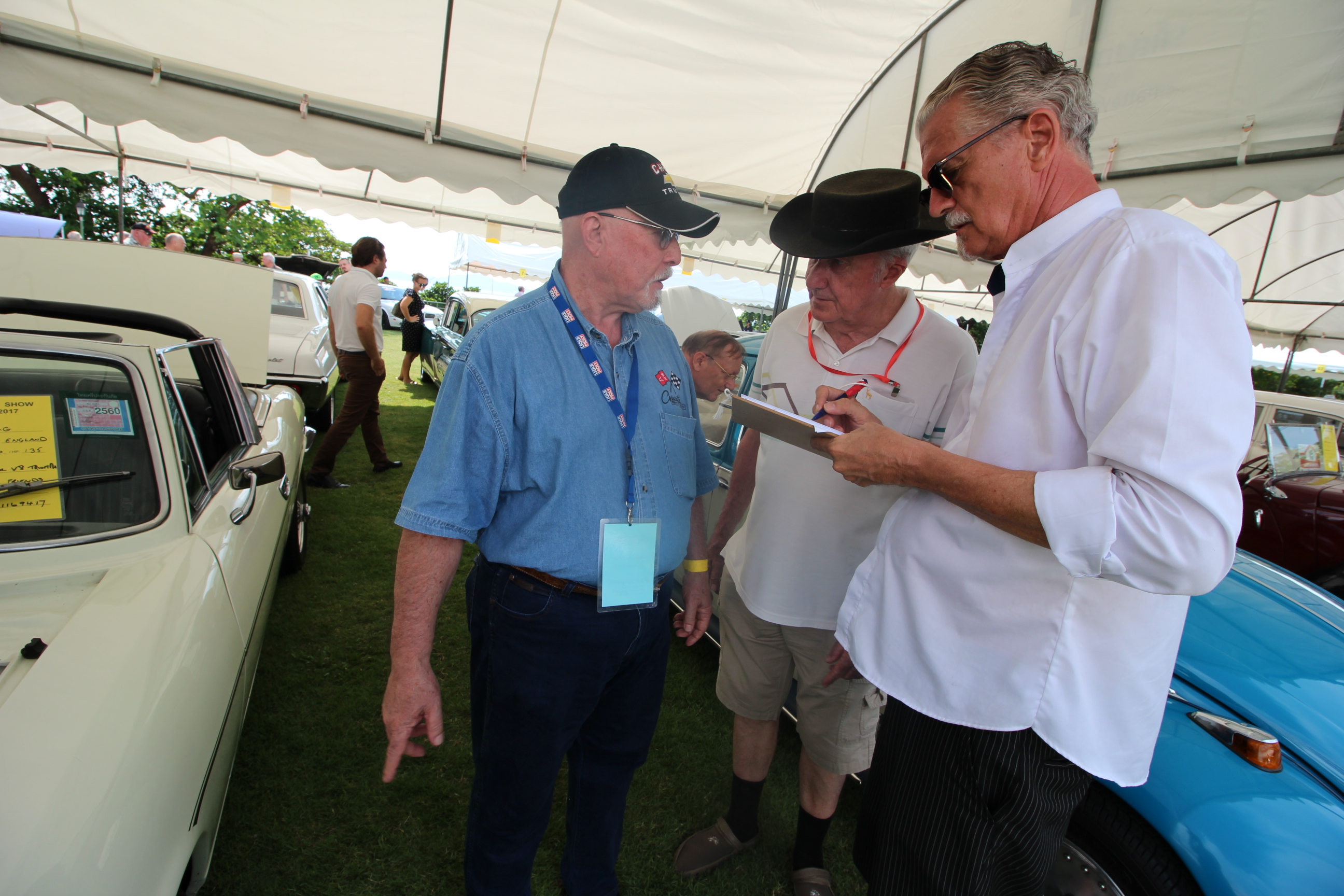 Dr. Iain Corness, Dr. Dean Gillard and Jo Klemm hard at work judging the collectors’ items.