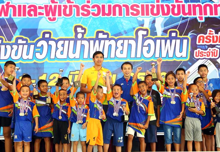 Youngsters hold up their medals following the conclusion of the 14th annual Pattaya Swimming Open championships.