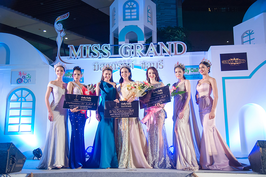 Miss Grand Chonburi winner Sudaporn “Amm” Wongsasiripat (center) is congratulated by runners-up and past champions.