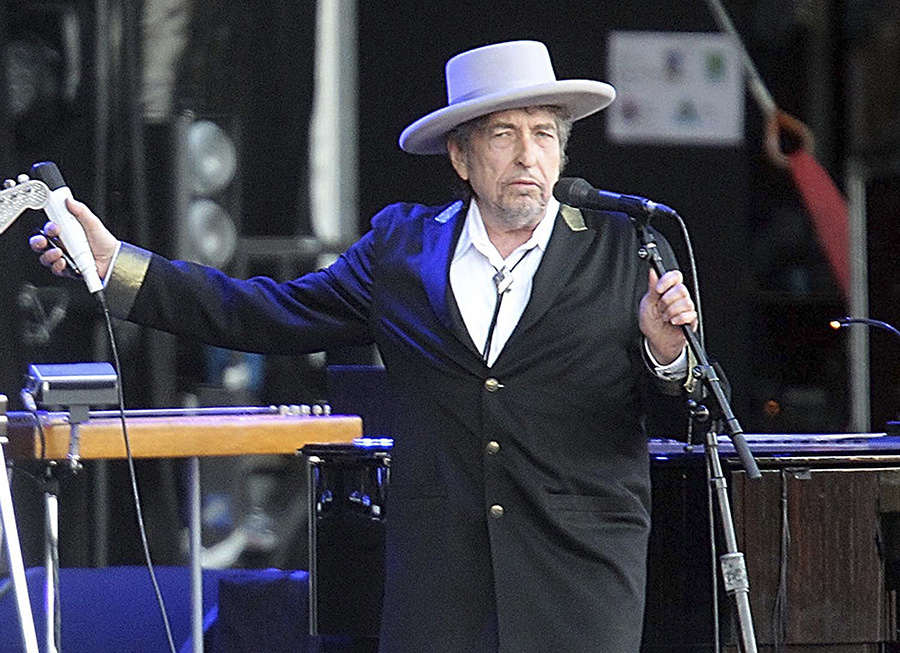 This July 22, 2012 file photo shows U.S. singer-songwriter Bob Dylan performing in Carhaix, western France. (AP Photo/David Vincent)