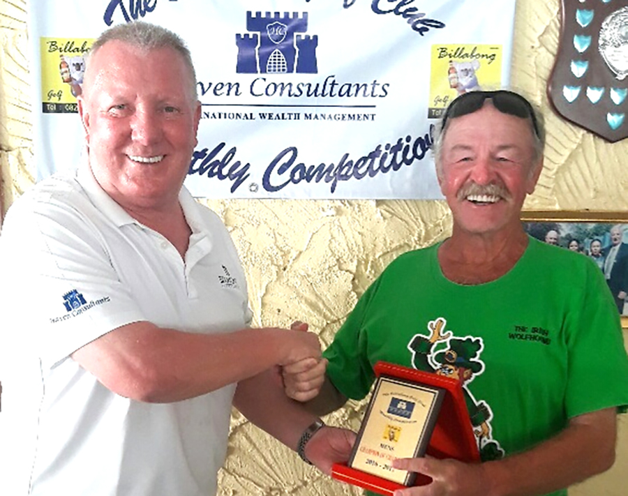 Brian Chapman (left) presents the annual medal to John Dearden.