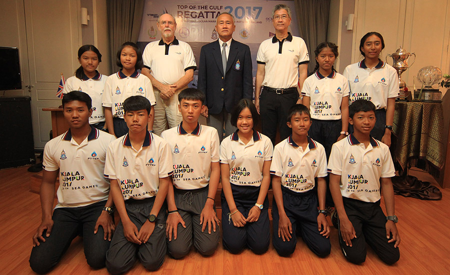 Young sailors and regatta organizers pose for a photo during a press conference in Bangkok to promote this year’s event.