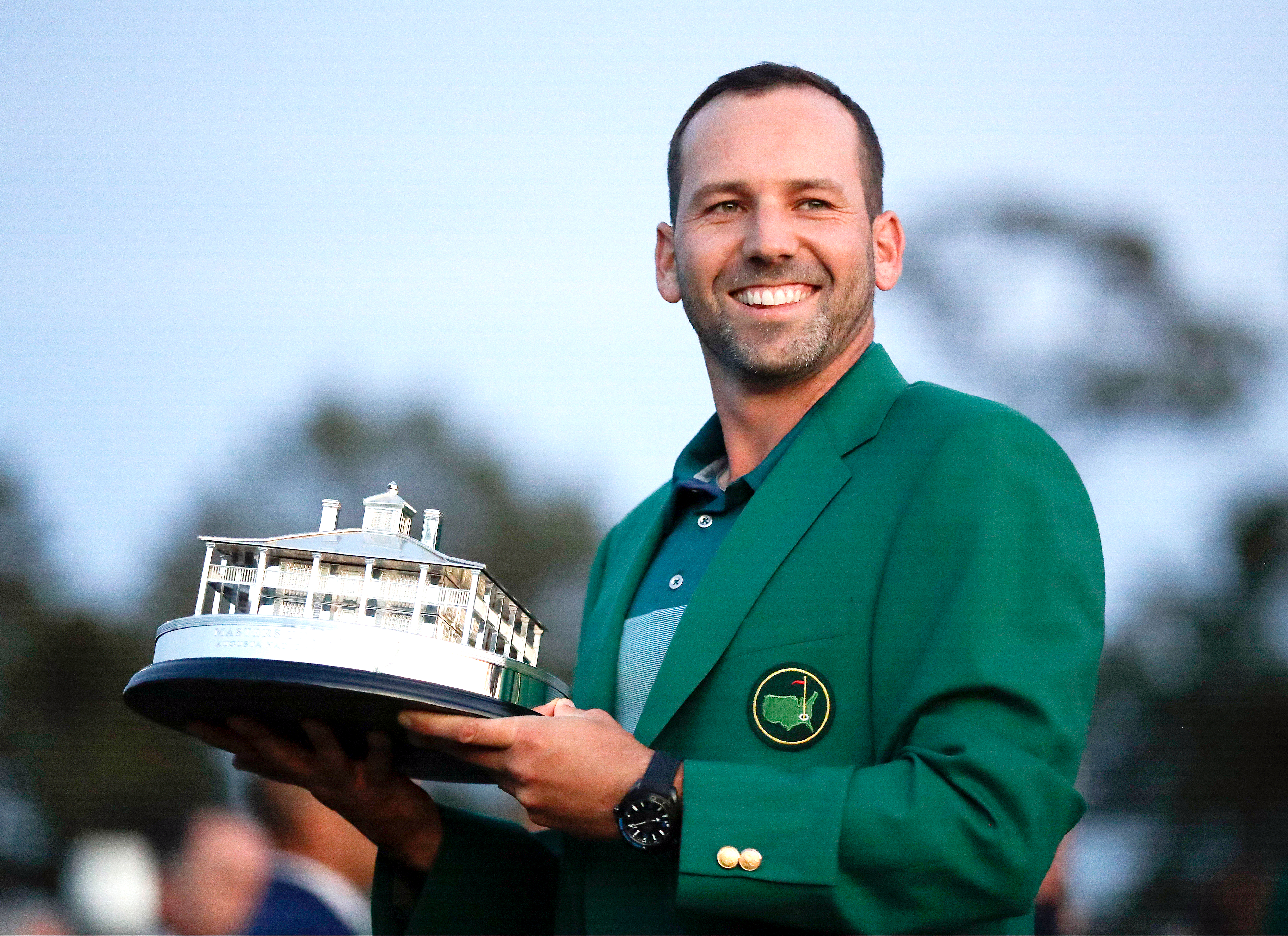 Sergio Garcia, of Spain, holds his trophy at the green jacket ceremony after the Masters golf tournament Sunday, April 9, in Augusta, Ga. (AP Photo/David Goldman)