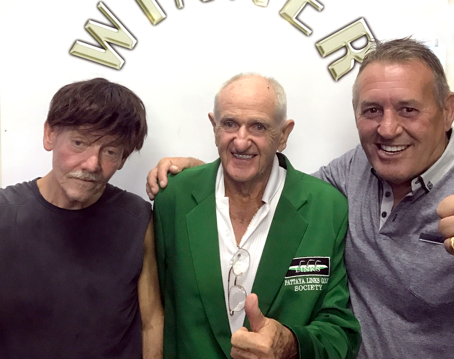 Frank Riley and Phil Davies with ‘wig’ wearer Niels Peters.
