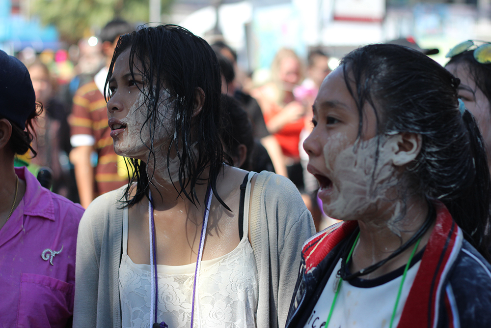 Apparently these two girls were just splashed with ice cold water.