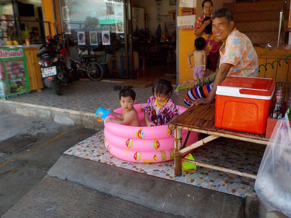 Never too young to cool off during a Soi Kophai Songkran.
